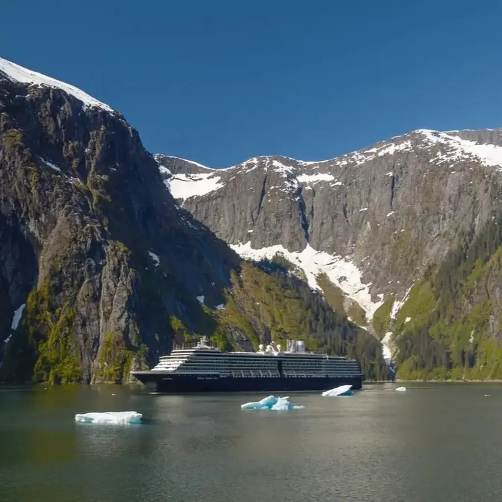 A cruise ship navigating the icy waters of the breathtaking Tracy Arm Fjords in Alaska, United States