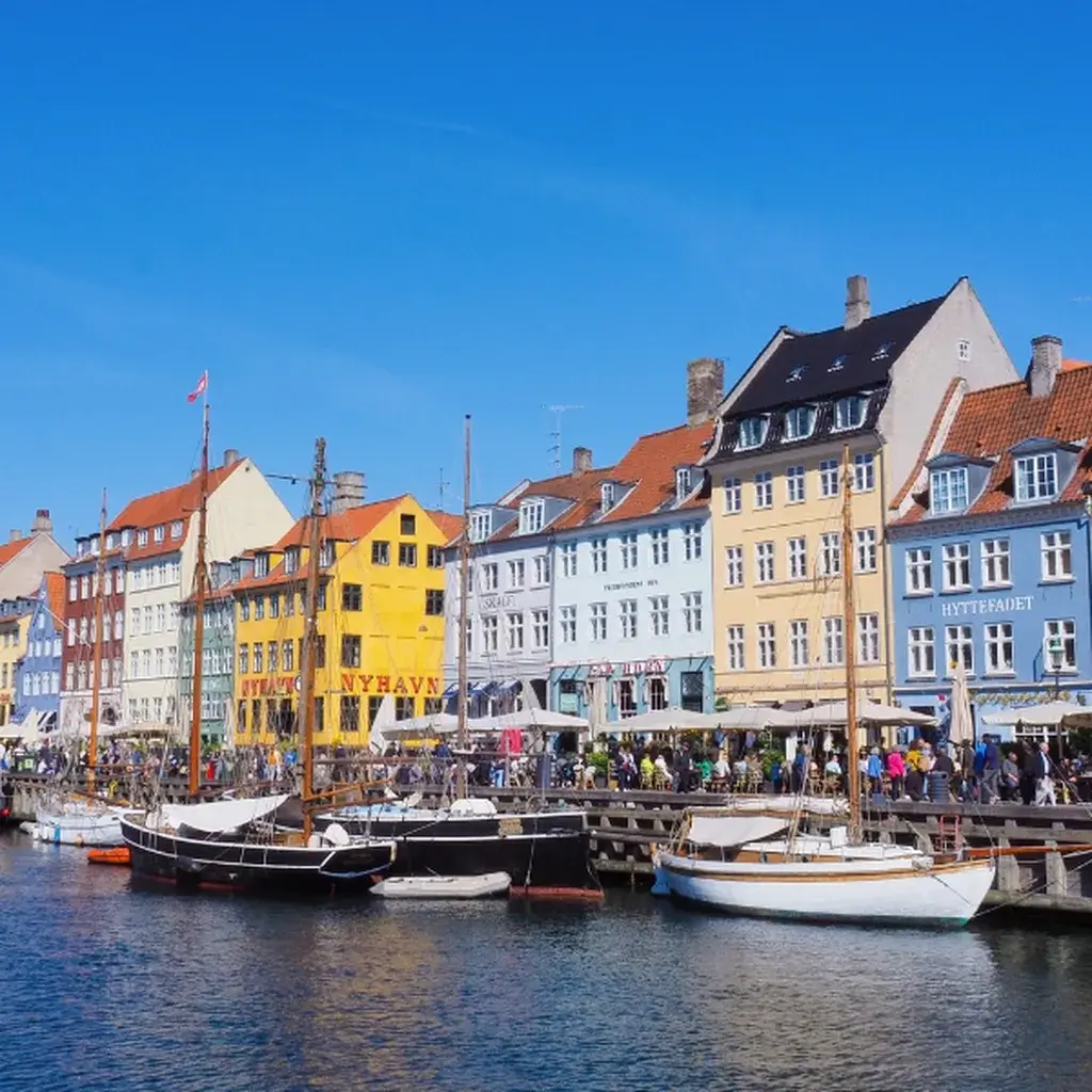 Colorful historic buildings lining the Nyhavn canal in Copenhagen, Denmark