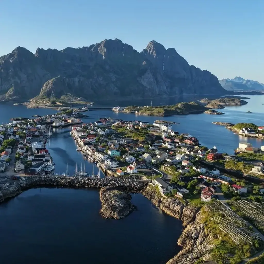 An aerial view of the Henningsvær fishing village in the snowy Lofoten Islands, Norway