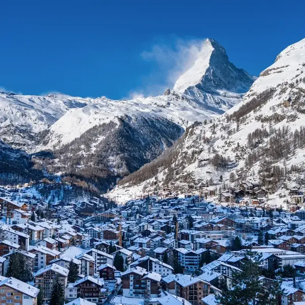 A picturesque snowy winter view of the alpine village of Zermatt in Switzerland